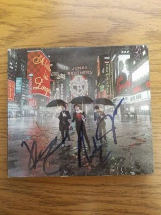 Jonas Brothers Signed Autographed Cd By All 3 Brothers.  A Little Bit Longer