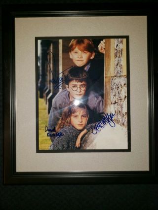 Harry Potter Photo Signed By Emma Watson,  Daniel Radcliffe & Rupert Grint
