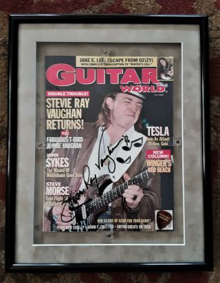 Stevie Ray Vaughan Signed 1989 Guitar World Plus Guitar Pick.