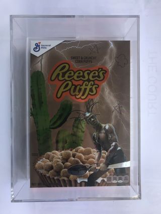 Travis Scott X Reese’s Puffs Cereal W/ Acrylic Case & Cactus Jack Spoon