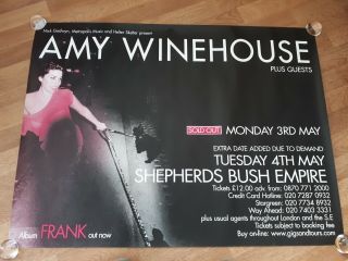Amy Winehouse Concert Poster Near Rolled Shepherds Bush