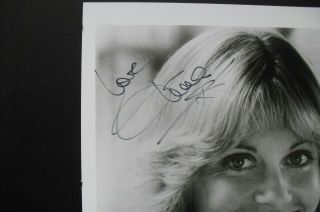 Photo signed by OLIVIA NEWTON - JOHN,  with,  8x10 6