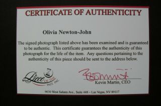 Photo signed by OLIVIA NEWTON - JOHN,  with,  8x10 8