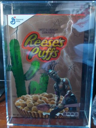Travis Scott Resee’s Puffs Cereal In A Acrylic Case With Bowl And Spoon.