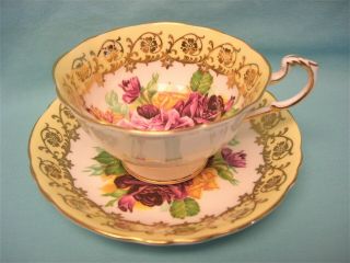 Paragon Cabbage Rose Tri Colors Tea Cup And Saucer Gold Gilt Design