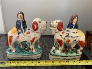 Staffordshire Prince And Princess Figurines On Large Dogs With Flower Baskets