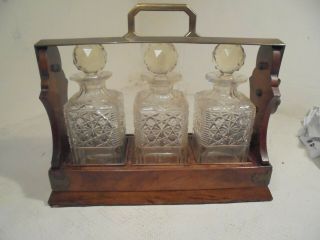 Antique 3 Cut Glass Bottle Tantalus,  Decanter Set