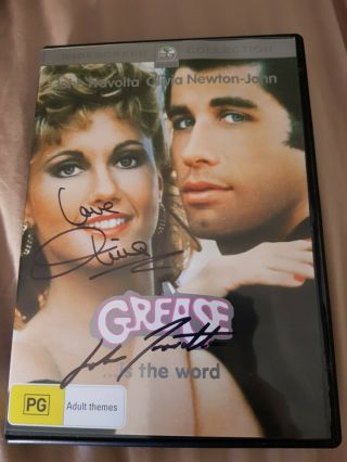 Grease Dvd Autographed By Olivia Newton John And John Travolta.  Rare.