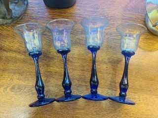 Set Of Four Signed Rick Strini Blue Stemmed Iridescenet Wine Glasses.