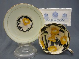 Wide Black Hand Painted Paragon England Daffodil Flowers Tea Cup & Saucer Duo