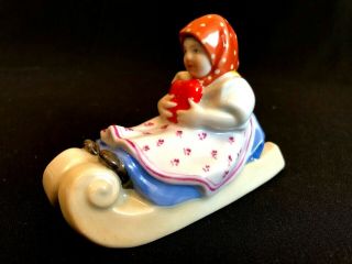 Herend Porcelain Handpainted Rare Girl On A Sled Holding Heart Figurine