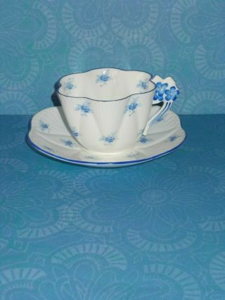 Dainty Floral Handled Cup And Saucer/ Blue And White Chintz/af