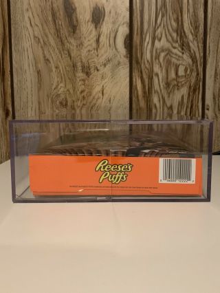 TRAVIS SCOTT X REESE’S PUFFS LIMITED EDITION CEREAL AND ACRYLIC BOX 6