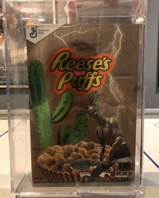 TRAVIS SCOTT X REESE’S PUFFS LIMITED EDITION CEREAL,  SUPREME STICKER AND PIN 3