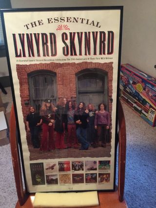 Lynyrd Skynyrd framed posters,  one is a promo poster the other a sketch 3