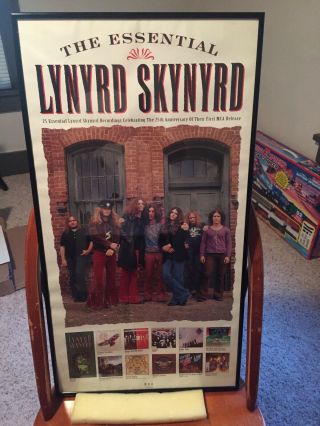 Lynyrd Skynyrd framed posters,  one is a promo poster the other a sketch 4