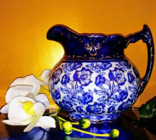 Antique D.  F.  Haynes Co.  Of Baltimore Flow Blue White Gold Hand Painted Pitcher
