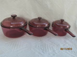 Set Of 3 Vintage Pyrex Vision Cranberry Pans 2.  5L 1.  5L 1.  0L with Lids 2