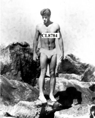 John F.  Kennedy Jr.  In An Underwear At The Beach Photo