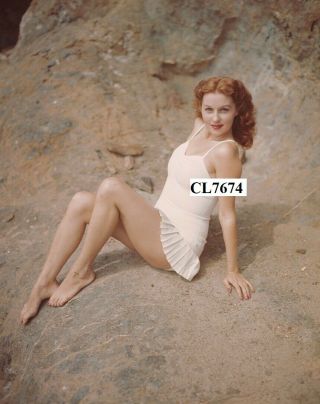Rhonda Fleming In A White Swimsuit With A Pleated Skirt Photo