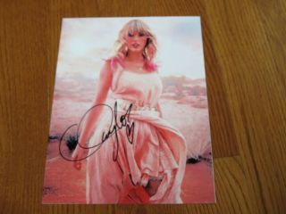 Taylor Swift Autographed 8.  5x11 Photo Signed