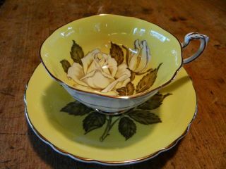 Paragon Yellow Floating Rose Cup & Saucer,  Flawed Beauty