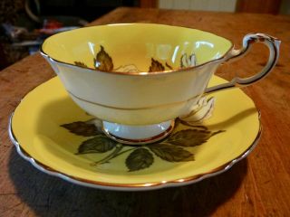 PARAGON YELLOW FLOATING ROSE CUP & SAUCER,  FLAWED BEAUTY 2