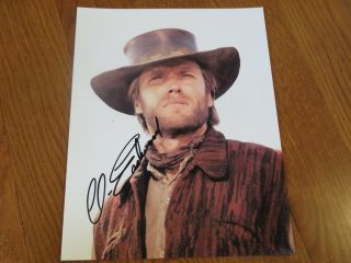 Clint Eastwood Autographed 8.  5x11 Photo Signed Hand