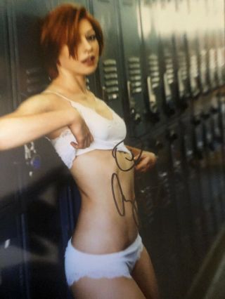 Alyson Hannigan,  Hand signed 8X10 photo.  Signed In Black Sharpie.  Really 3