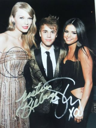 Justin Bieber,  Selena Gomez And Friend Triple Signed Photo