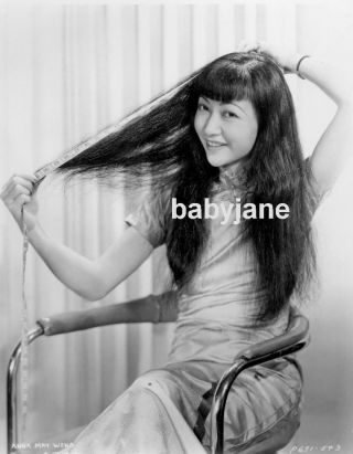 010 Anna May Wong Measures The Length Of Her Hair Photo