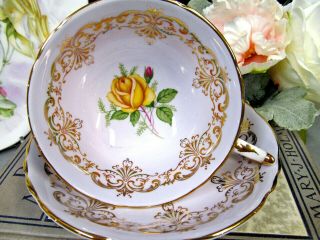 Paragon tea cup and saucer lavender teacup and yellow rose centers gold gilt 6