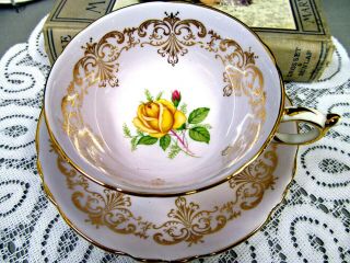 Paragon tea cup and saucer lavender teacup and yellow rose centers gold gilt 8