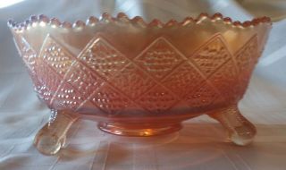 Depression Orange Marigold Carnival Glass Bowl With Ball And Claw Feet.