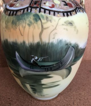 ANTIQUE NIPPON HAND PAINTED INDIAN IN CANOE VASE 7 - 1/4” 2