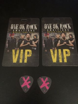 Two One Ok Rock Guitar Picks And Two Vip Passes