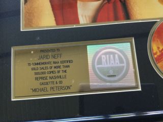 Michael Peterson.  RIAA Award for for sales of 500,  000 lp,  cassette & cd 2