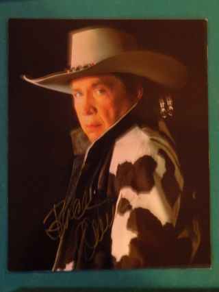 Buck Owens Autographed 8x10 Color Picture With Certificate Of Authenticity.