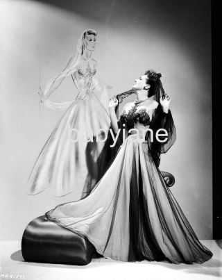 167 Joan Crawford Poses By Costume Sketch By Irene Reunion In France Photo