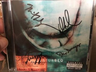 Disturbed Autographed The Sickness Cd Signed By All 4 Band Members.