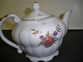 Windup Porcelain Teapot Plays " Tea For Two And Two For Tea "