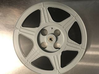 10.  5” Gray Plastic Film Reel 16mm With Film And Case