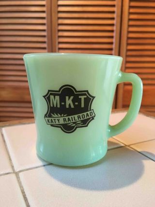 Old M - K - T Railroad Katy Railroad Jadite Advertising Fire King Coffee Mug