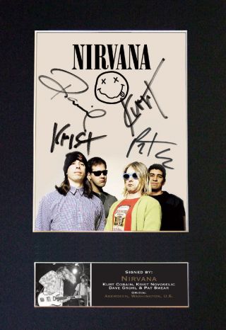 Nirvana - Signed By All 4 Band Members - Autographed Photograph - Museum Grade