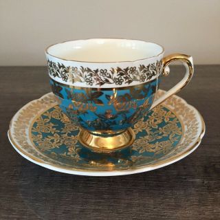 Stanley China Gold Chinz Leaves Over Topaz/turquoise Teacup And Saucer