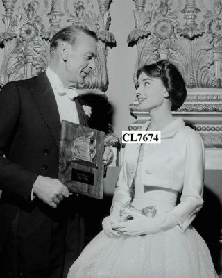 Gary Cooper Shows His Exhibitors Laurel Award Plaque To Audrey Hepburn Photo