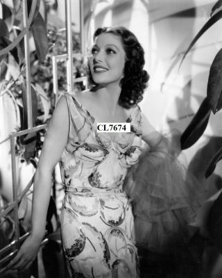 Loretta Young Wearing A Satin Dress,  Printed With Shades Of Rose Portrait Photo