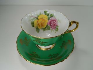 Paragon Yellow Pink Rose Tea Cup And Saucer.  Green With Gold Gilt.