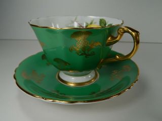 Paragon Yellow Pink Rose Tea Cup and Saucer.  Green with Gold Gilt. 2