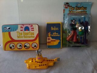 Beatles Memorabilia.  Yellow Submarine Tin And Model,  Action Figure,  Movie Vhs